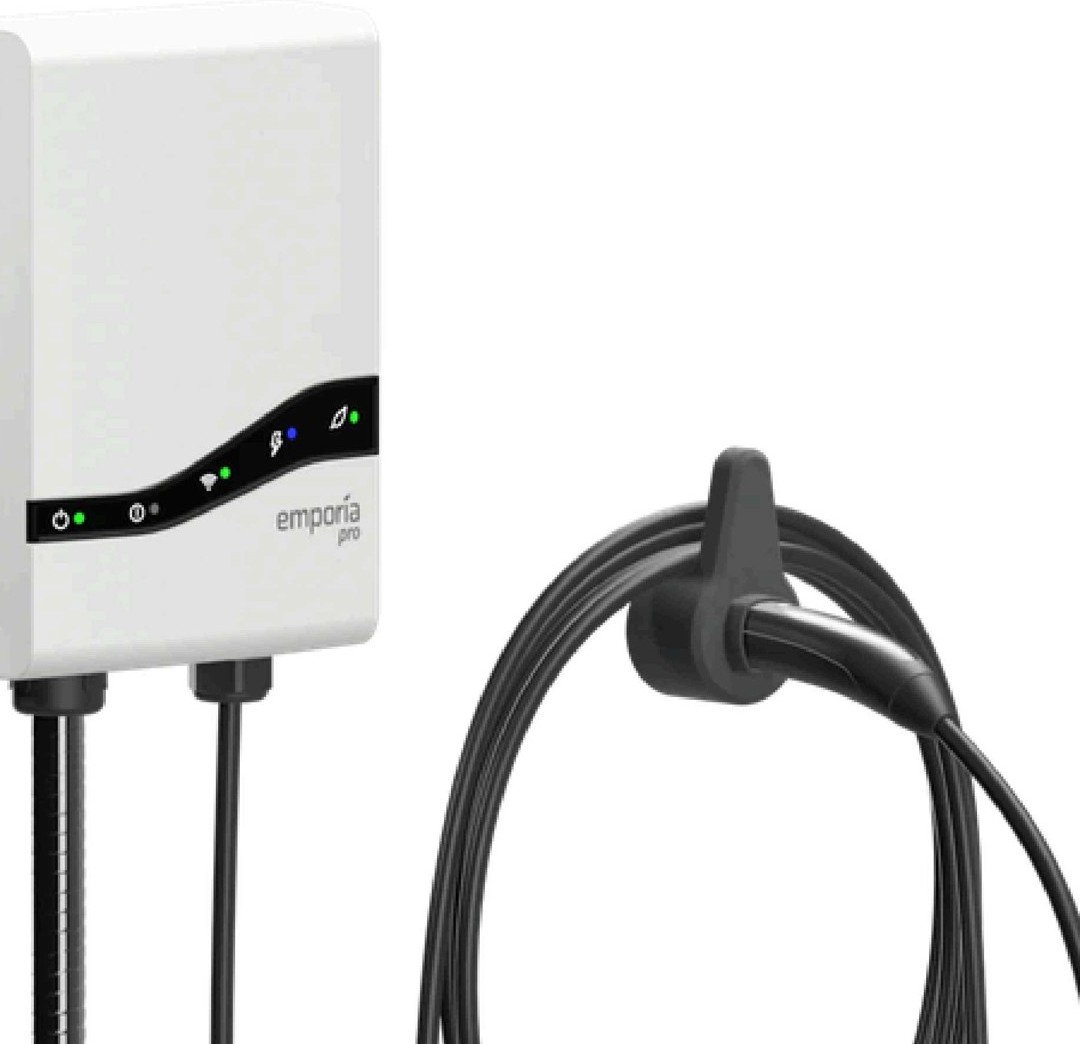 Wall-mounted EV charger with cable management